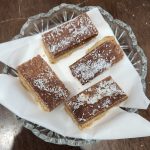 Coconut Chocolate Shortbread slice on a plate